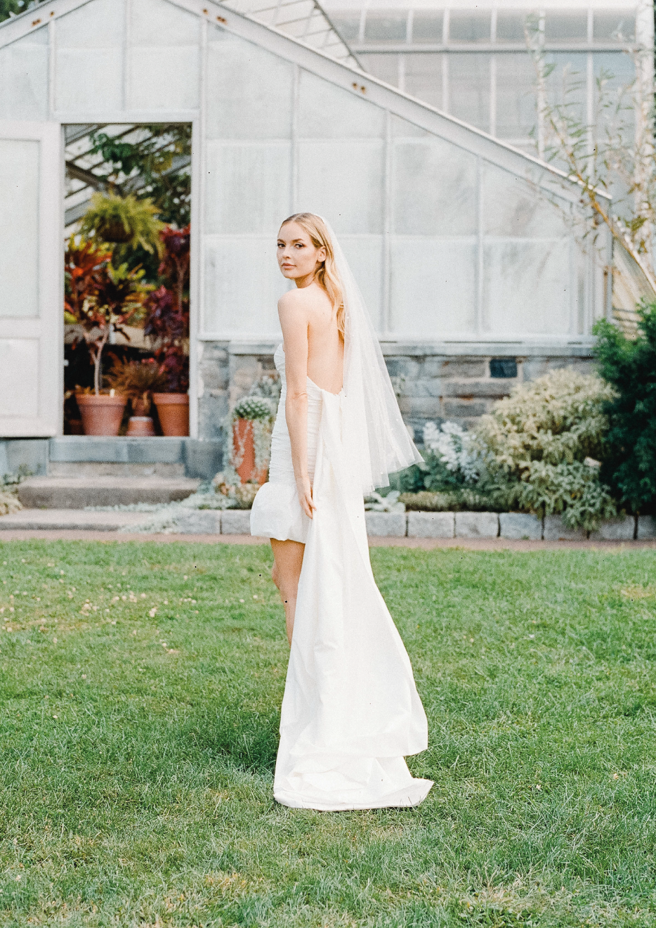 Wedding dress model Grace - Dress in Strapless style ruched body with puffy hem and detachable train - Verdin New York